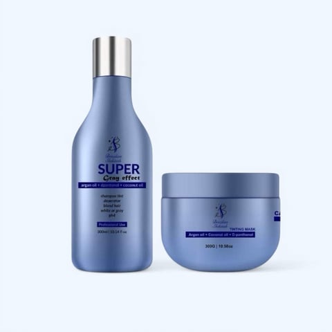 Two blue hair care products with silver caps: a Super Crag Effect shampoo bottle and matching treatment mask jar
